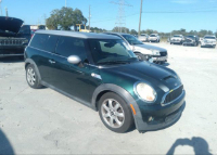 Mini Cooper color verde oscuro con pequeños detalles cosméticos